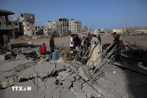 Cảnh đổ nát sau cuộc không kích của Israel xuống Dải Gaza ngày 31/3/2024. (Ảnh: THX/TTXVN)