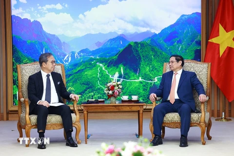 Thủ tướng Phạm Minh Chính tiếp Đại sứ Đặc mệnh toàn quyền Nhật Bản Yamada Takio đến chào từ biệt kết thúc nhiệm kỳ công tác tại Việt Nam. (Ảnh: Dương Giang/TTXVN)