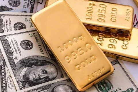 Giá vàng thế giới đi xuống, trước đà tăng của đồng USD.