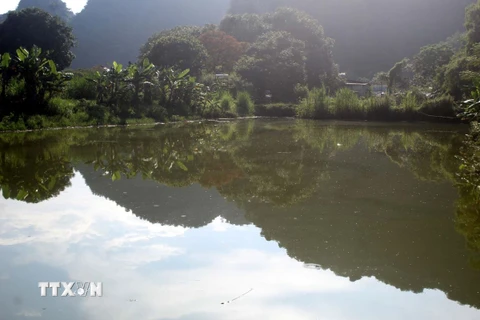 Đập hồ Làng Ngọc, xã Cẩm Lương, huyện miền núi Cẩm Thủy cống tràn đã hư hỏng, xuống cấp. (Ảnh: Nguyễn Nam/TTXVN)