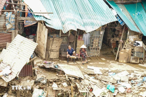 Cuộc sống đang dần trở lại bình thường tại xóm trọ nghèo dưới chân cầu Long Biên (ảnh chụp ngày 15/9/2024). (Ảnh: Khánh Hòa/TTXVN)