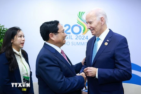 Thủ tướng Phạm Minh Chính gặp Tổng thống Hoa Kỳ Joe Biden tại Hội nghị thượng đỉnh G20. (Ảnh: Dương Giang/TTXVN)