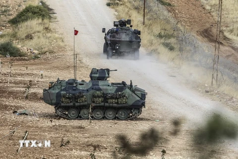 Các tay súng người Kurd và IS giao tranh ác liệt ở thị trấn Kobane 