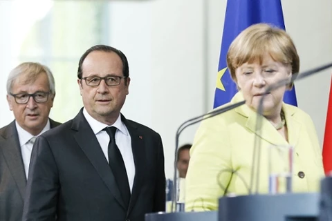 Thủ tướng Đức Angela Merkel, Tổng thống Pháp Francois Hollande và Chủ tịch Ủy ban châu Âu (EC) Jean-Claude Juncker. (Nguồn: DDP USA) 