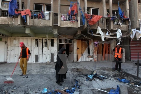 Hiện trường một vụ đánh bom liều chết tại Iraq. (Nguồn: AFP/TTXVN)