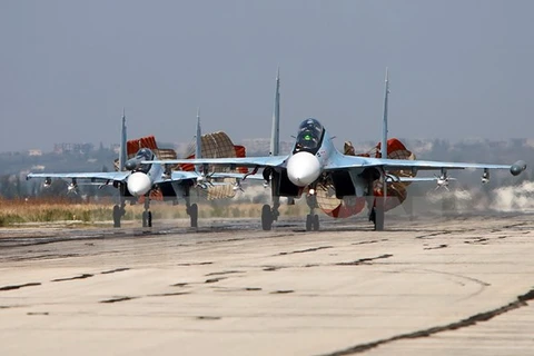 Máy bay Sukhoi SU-24 của Nga tại căn cứ không quân Hmeimim ở tỉnh Latakia, Syria ngày 3/10. (Nguồn: AFP/TTXVN)