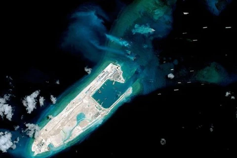 Ảnh chụp vệ tinh Đá Chữ Thập thuộc quần đảo Trường Sa của Việt Nam mà phía Trung Quốc chiếm đóng, xây dựng trái phép. (Nguồn: AFP)