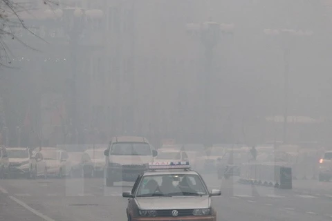 Khói mù bao phủ thành phố Trường Xuân, thủ phủ tỉnh Cát Lâm, Trung Quốc ngày 8/11. (Nguồn: AFP/TTXVN)
