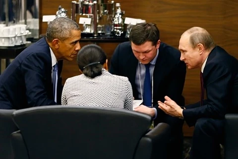 Tổng thống Nga Vladimir Putin (phải) và người đồng cấp Mỹ Barack Obama tại cuộc hội đàm bên lề Hội nghị G-20. (Nguồn: EPA)