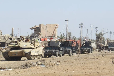 Quân đội Iraq tiến vào giải phóng Jwaibah, ngoại ô phía Đông Ramadi, ngày 7/2. (Nguồn: AFP)