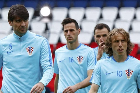 Luka Modric (phải) và các đồng đội liệu có thể làm nên chuyện lớn cho Croatia? (Nguồn: Reuters)