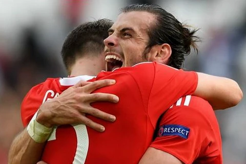 Gareth Bale ăn mừng bàn thắng lịch sử. (Nguồn: Getty)