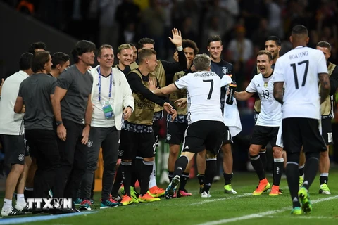 Niềm vui của các cầu thủ đội tuyển Đức. (Nguồn: AFP/TTXVN)