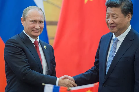 Chủ tịch Trung Quốc Tập Cận Bình (phải) và Tổng thống Nga Vladimir Putin. (Nguồn: Sputnik) 