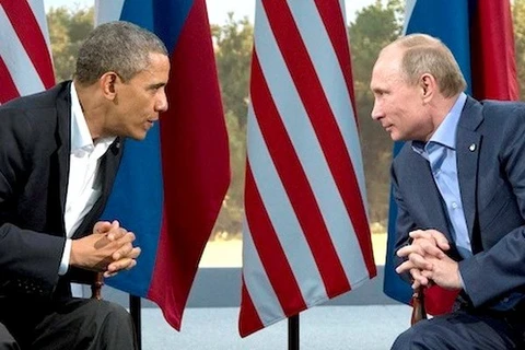 Tổng thống Mỹ Obama (trái) gặp Tổng thống Nga Putin ở Bắc Ireland, tháng 6/2013. (Nguồn: AP