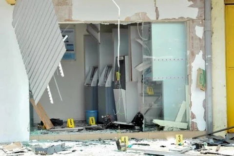 Hiện trường vụ án dùng chất nổ phá máy ATM để cướp 260.000 ringgit. (Nguồn: Bernama)