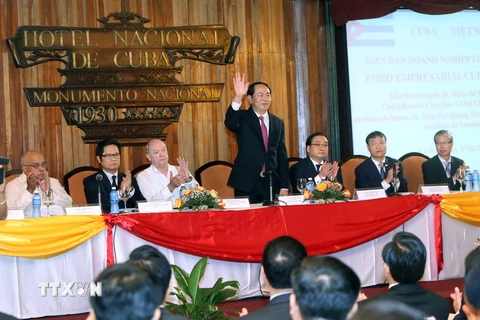 Chủ tịch nước Trần Đại Quang đến dự và phát biểu tại Diễn đàn Doanh nghiệp Việt Nam-Cuba. (Ảnh: Nhan Sáng/TTXVN) 