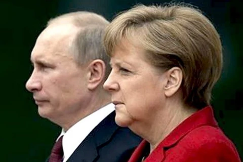 Thủ tướng Đức Merkel và Tổng thống Nga Putin. (Nguồn: AP)