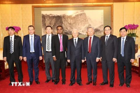 Tổng Bí thư Nguyễn Phú Trọng với các đại biểu. (Ảnh: Trí Dũng/TTXVN)
