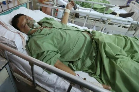 Nạn nhân Poh Keat Chye đang được điều trị tại bệnh viện. (Nguồn: New Straits Times)