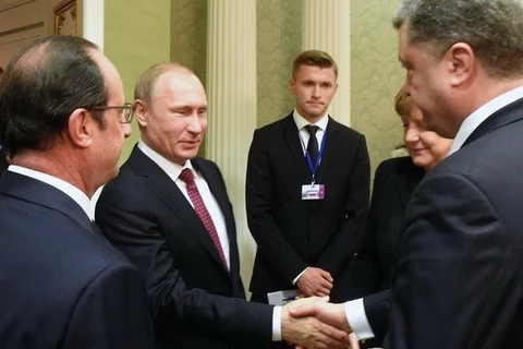 Các nhà lãnh đạo 4 nước Pháp, Đức, Nga, Ukraine tại Paris. (Nguồn: AP)