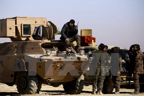 Lực lượng dân chủ Syria trong chiến dịch tấn công thành phố Raqqa. (Nguồn: AFP/TTXVN)