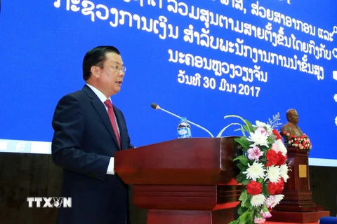 Bộ trưởng Bộ Tài chính Đinh Tiến Dũng phát biểu tại Hội thảo. (Ảnh: Phạm Kiên/TTXVN)