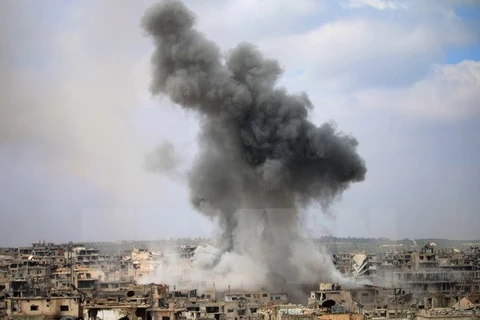 Cảnh đổ nát sau các cuộc giao tranh tại thành phố Daraa, miền nam Syria. (Nguồn: AFP/TTXVN)