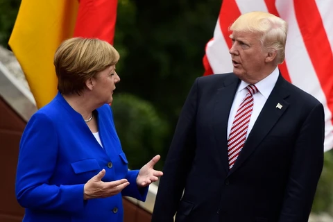 Thủ tướng Đức Angela Merkel và Tổng thống Mỹ Trump. (Nguồn: AFP)