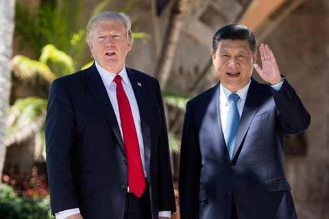 Chủ tịch Trung Quốc Tập Cận Bình (phải) và Tổng thống Mỹ Donald Trump. (Nguồn: AFP)