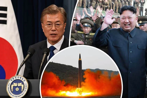 Tổng thống Moon Jae-in (trái) và nhà lãnh đạo Triều Tiên Kim Jong-un. (Nguồn: express.co.uk)