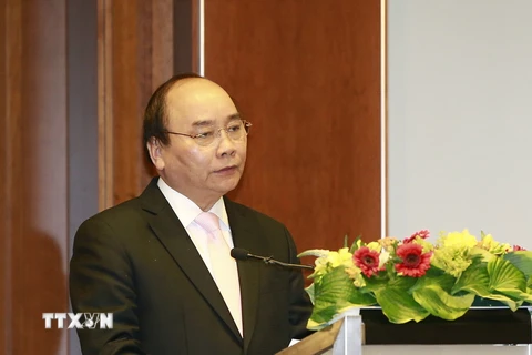 Thủ tướng Nguyễn Xuân Phúc dự Diễn đàn Doanh nghiệp Việt Nam-Đức. (Ảnh: Thống Nhất/TTXVN)