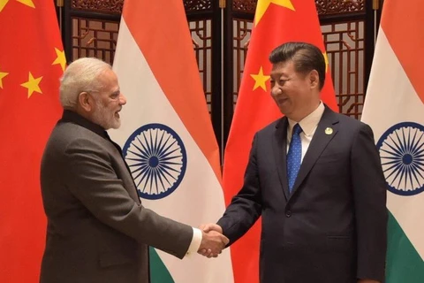 Chủ tịch Trung Quốc Tập Cận Bình (phải) và Thủ tướng Ấn Độ Narendra Modi. (Nguồn: Twitter)