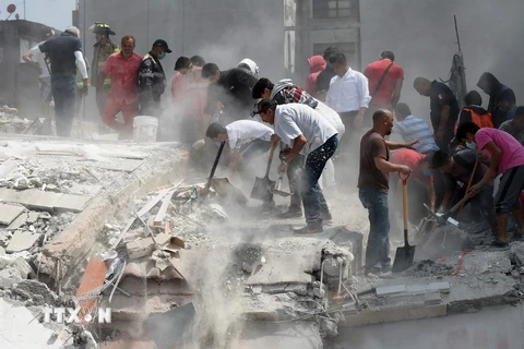Trận động đất đã làm 20 tòa nhà đổ sập chỉ tính riêng ở thủ đô Mexico City. (Nguồn: AFP/TTXVN)