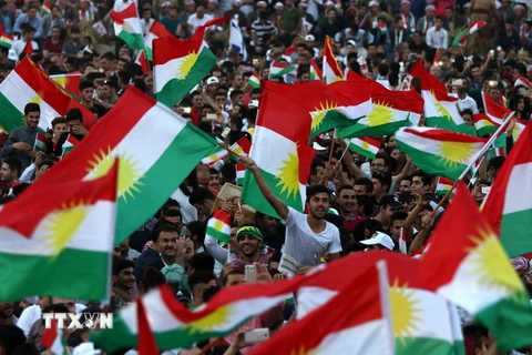 Cộng đồng người Kurd ở Iraq tuần hành kêu gọi người dân tham gia cuộc trưng cầu dân ý về độc lập tại thủ phủ Arbil ngày 16/9. (Nguồn: AFP/TTXVN)