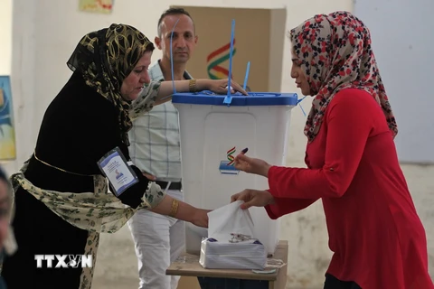 Người Kurd bỏ phiếu trưng cầu ý dân ở thành phố Kirkuk, miền bắc Iraq ngày 25/9. (Nguồn: AFP/TTXVN)