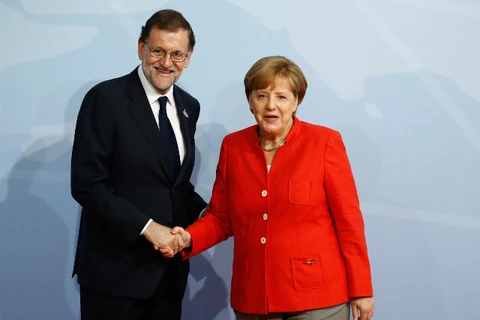 Thủ tướng Đức Angela Merkel và người đồng cấp Tây Ban Nha Mariano Rajoy. (Nguồn: AFP)