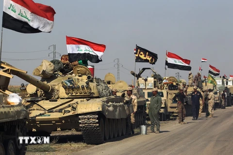 Các lực lượng Iraq tiến vào ngoại ô phía nam thành phố Kirkik. (Nguồn: AFP/TTXVN)