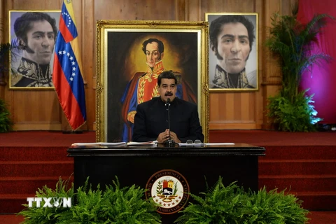 Tổng thống Venezuela Nicolas Maduro phát biểu trong cuộc họp báo ở Phủ Tổng thống. (Nguồn: AFP/TTXVN)