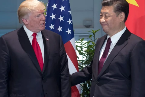 Tổng thống Mỹ Donald Trump và Chủ tịch Trung Quốc Tập Cận Bình trong một cuộc gặp hồi tháng 7. (Nguồn: AFP)