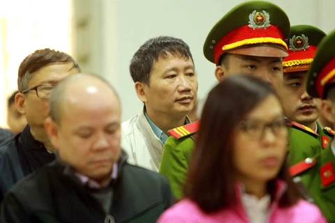 Bị cáo Trịnh Xuân Thanh và các đồng phạm nghe tòa tuyên án. (Ảnh: An Đăng/TTXVN)