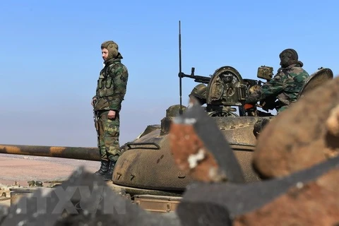 Binh sỹ quân đội Chính phủ Syria triển khai tại Jabal al-Hass, tỉnh Aleppo. (Nguồn: AFP/TTXVN)