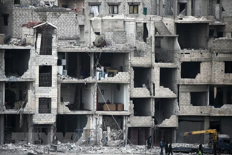 Cảnh đổ nát tại tại Otaybah, Đông Ghouta, Syria. (Nguồn: AFP/TTXVN)
