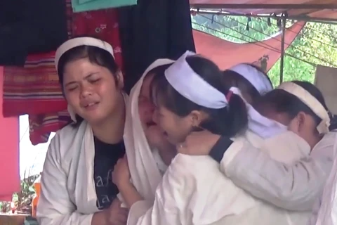 Vụ sạt núi tại xóm Khanh đã khiến 18 người tử nạn, để lại bao nỗi đau cho người thân. (Ảnh: VTC/Vietnam+)