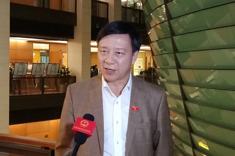 Đại biểu Quốc hội tỉnh Hải Dương Phạm Xuân Thăng chia sẻ với báo chí. (Ảnh: Hùng Võ/Vietnam+)