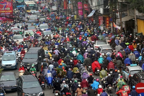 Tắc đường đã trở nên quá phổ biến ở các đô thị lớn, nhất là Hà Nội và Thành phố Hồ Chí Minh. (Nguồn ảnh: TTXVN)