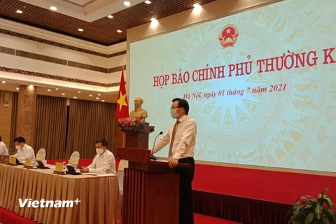 Bộ trưởng, Chủ nhiệm Văn phòng Chính phủ Trần Văn Sơn phát biểu tại Họp báo. (Ảnh: Hùng Võ/Vietnam+)