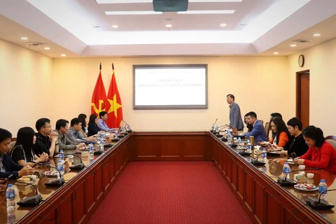 Buổi trao đổi giữa Báo Điện tử VietnamPlus và Báo Hà Tĩnh. (Ảnh: Hoài Nam/Vietnam+)