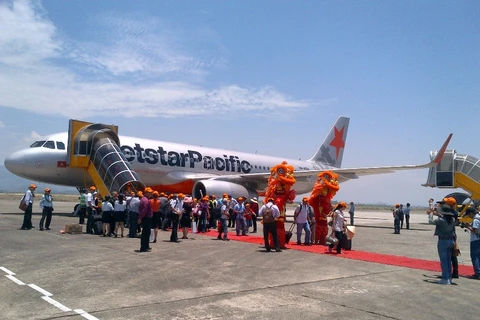 Hành khách trên chuyến bay của Jetstar. (Ảnh: Jetstar Pacific)