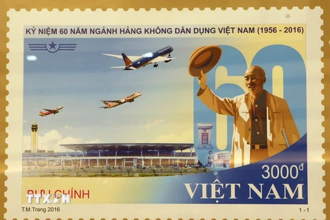 Mẫu tem đặc biệt kỷ niệm 60 năm ngành Hàng không dân dụng Việt Nam. (Ảnh: Tuấn Anh/TTXVN)